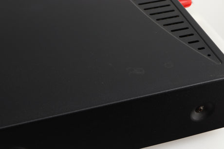 Close up of a used Arcam Alpha 8R Integrated Amplifier in a black finish showing marks on top