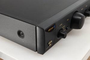 Front left corner of a used Arcam Alpha 8R Integrated Amplifier in a black finish