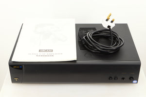 View of a used Arcam Alpha 9 Power Amplifier showing mains cable, and manual
