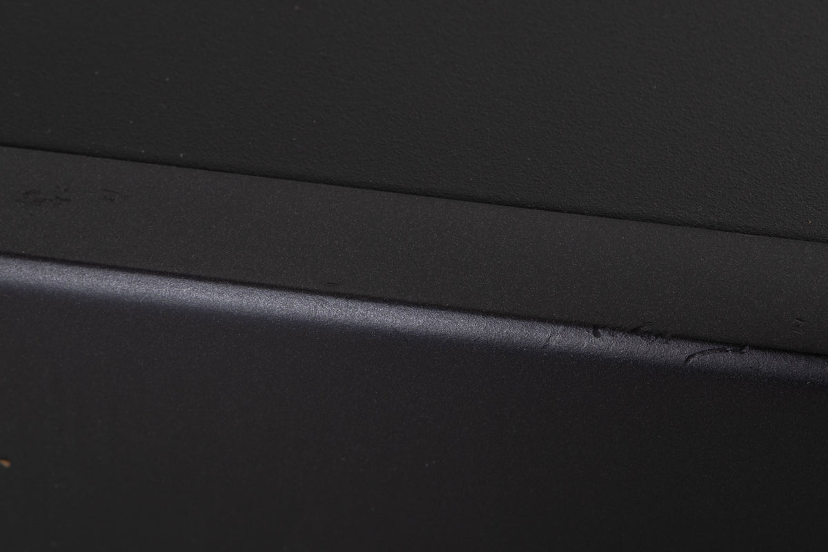 Close up of a used Arcam Alpha 9 Power Amplifier in a Black finish showing scratches on front edge