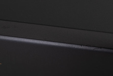 Close up of a used Arcam Alpha 9 Power Amplifier in a Black finish showing scratches on front edge