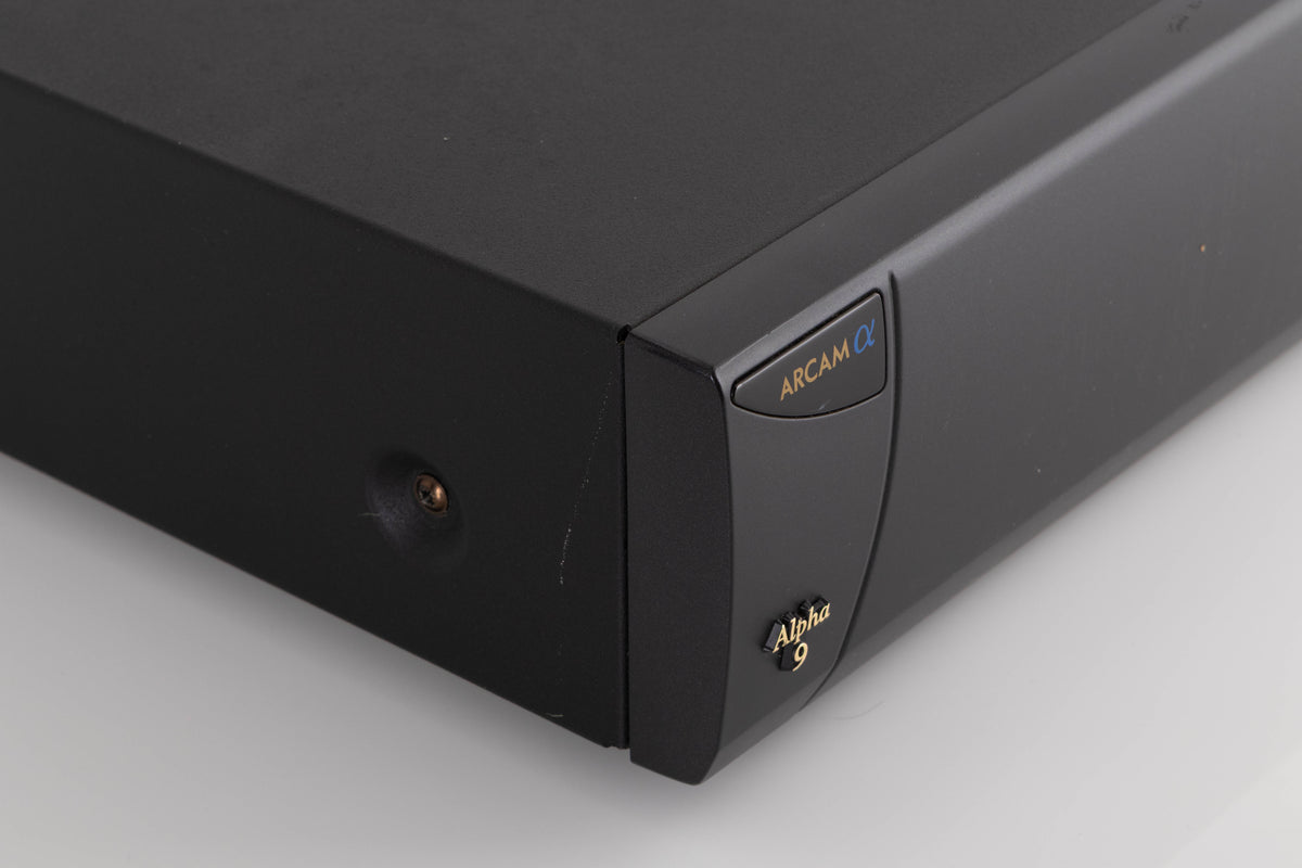 Front left corner of a used Arcam Alpha 9 Power Amplifier in a Black finish