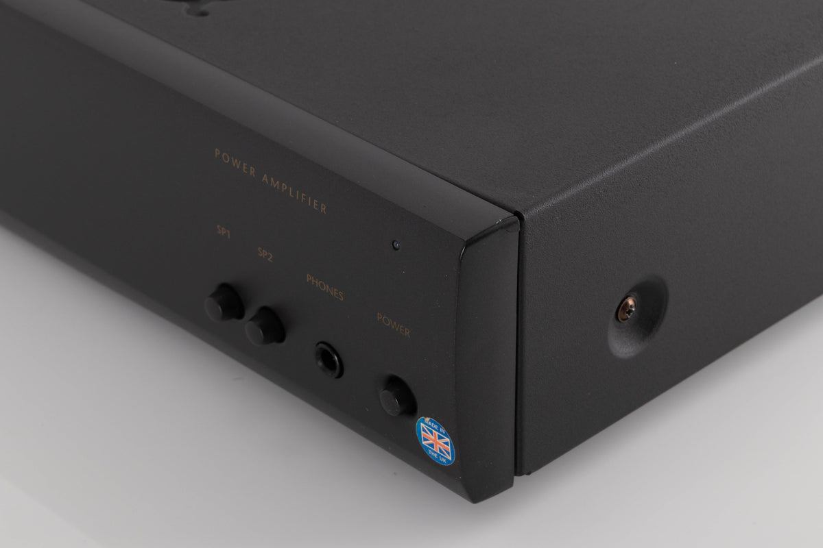 Front right corner of a used Arcam Alpha 9 Power Amplifier in a Black finish