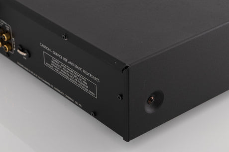 Rear left corner of a used Arcam Alpha 9 Power Amplifier in a Black finish