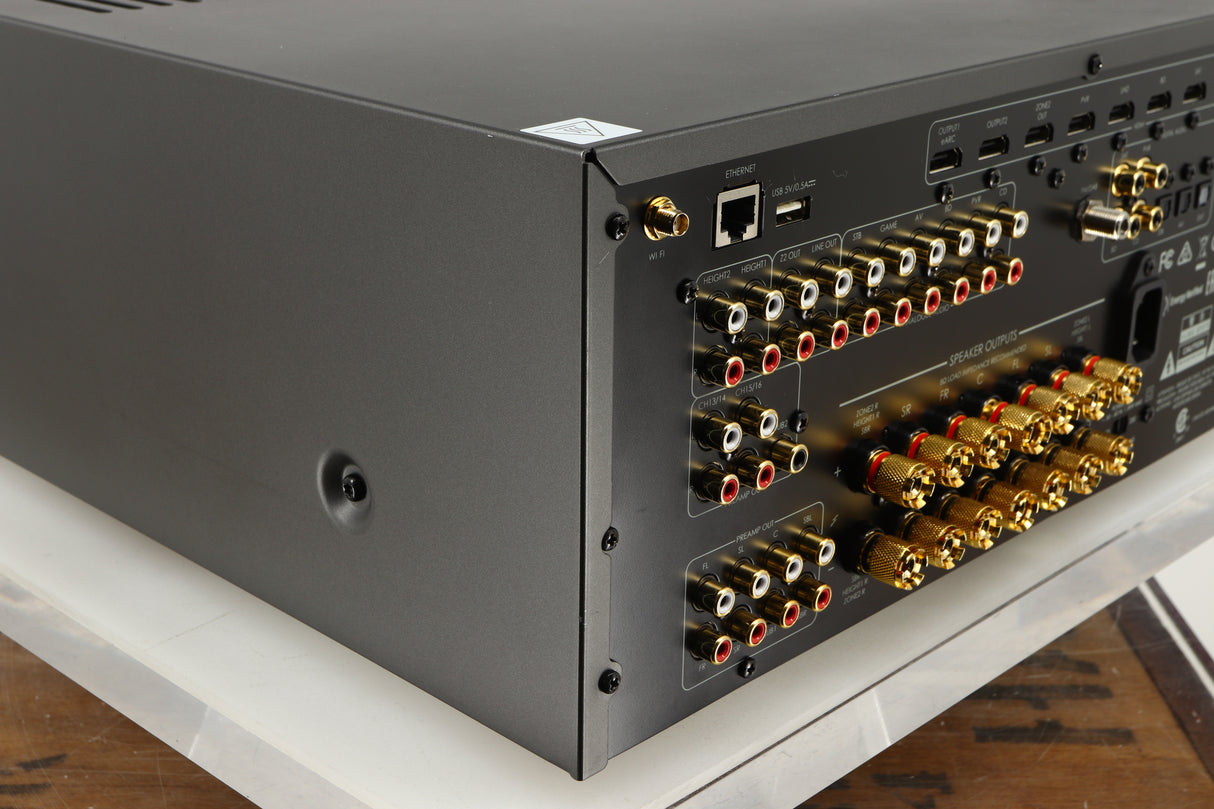 Rear right corner of a used Arcam AVR30 AV Amplifier in a grey finish