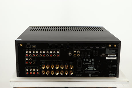 Rear view of a used Arcam AVR30 AV Amplifier in a grey finish showing Mains Input, Speaker Outputs, Phono Inputs, Phono Outputs, HDMI Outputs, Network Input, USB Input and Optical Output