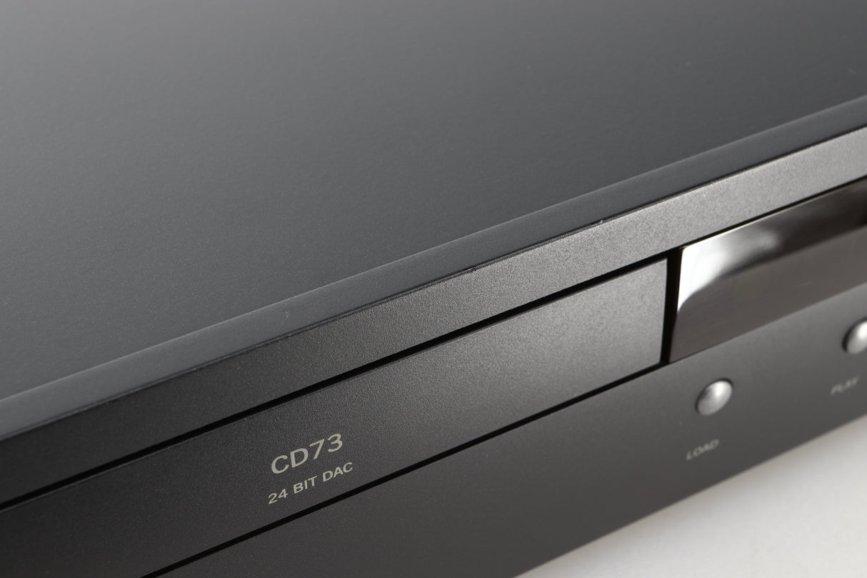Close up view of a used Arcam CD73T CD Player in Black finish showing some small dents and scratches on the front edge