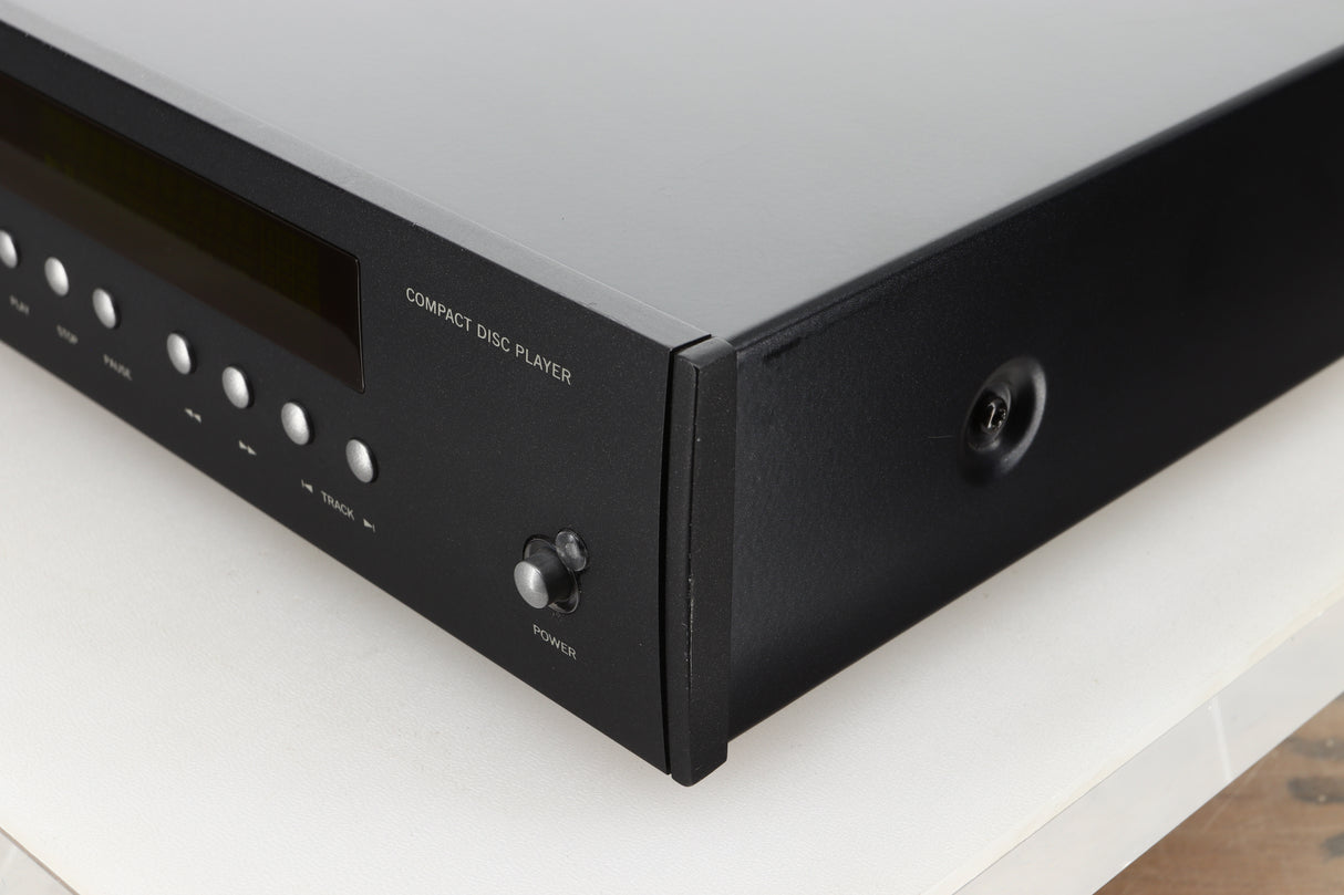 Front right corner view of a used Arcam CD73T CD Player in Black finish