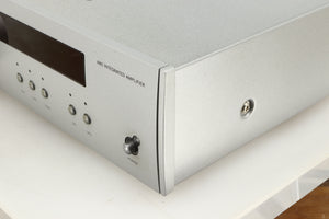 Front right corner of a used Arcam Diva A85 Integrated Amplifier in a silver finish