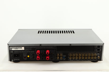 Rear view of a used Arcam Diva A85 Integrated Amplifier in a silver finish showing Phono Inputs, Phono Outputs and Mains Input