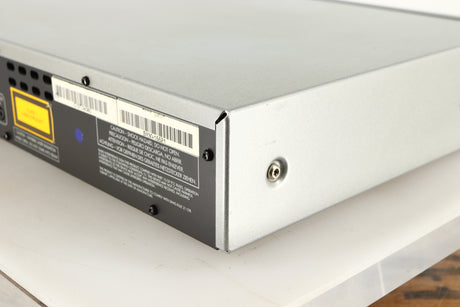 Rear left corner of a used Arcam Diva CD72 CD Player in a silver finish