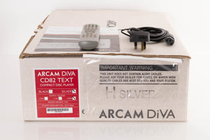 Box of a used Arcam DiVA CD82T CD Player in Silver with mains cable, manual, and remote
