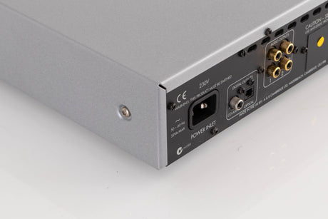 Rear left corner view of a used Arcam DiVA CD82T CD Player in Silver
