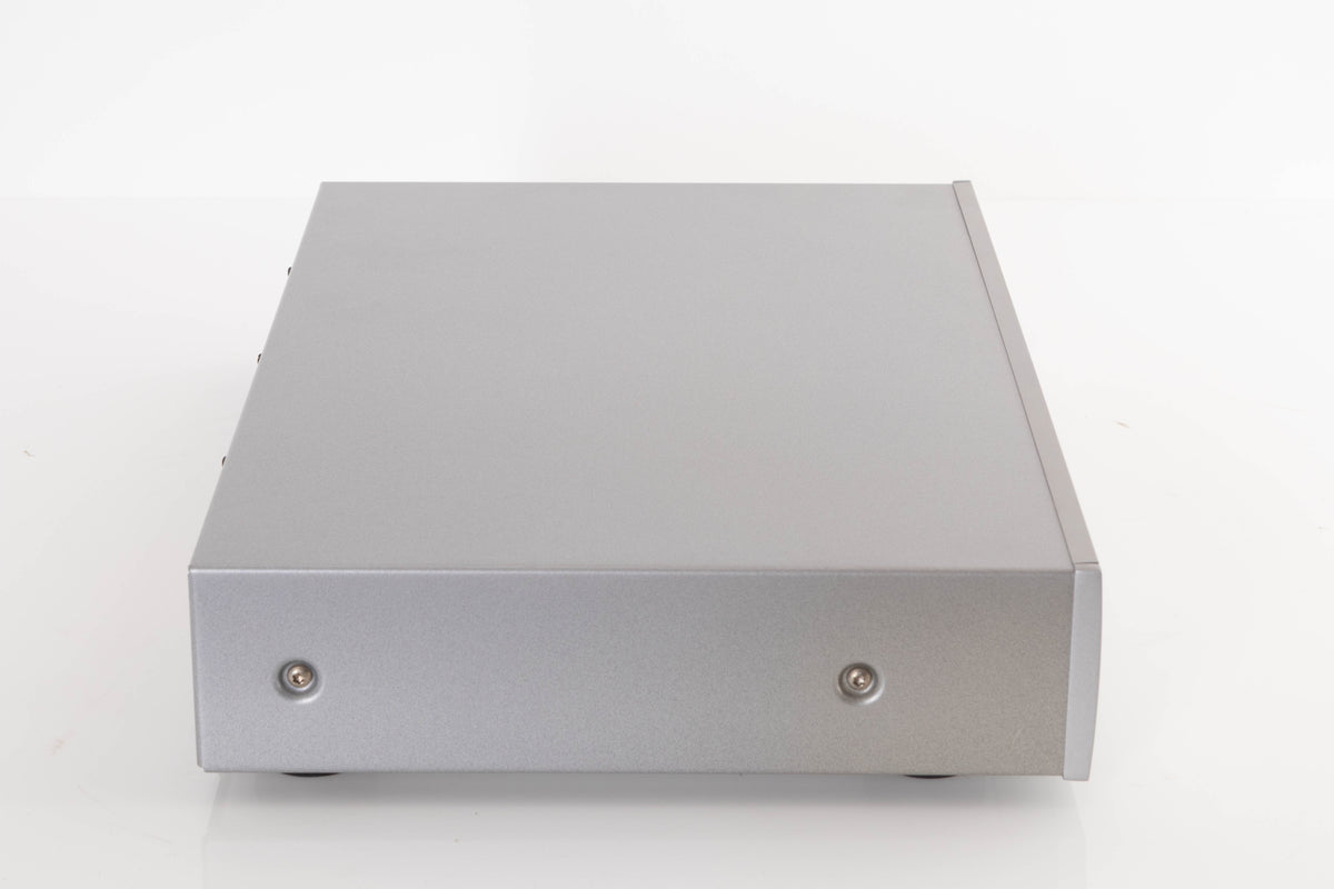 Side view of a used Arcam DiVA CD82T CD Player in Silver
