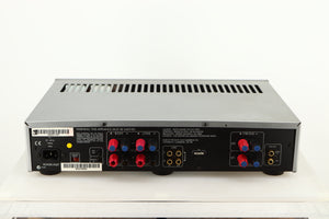 Rear view of a used Arcam P85/3 Power Amplifier in a silver finish showing Mains Input, Phono Inputs and Phono Outputs
