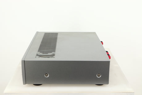 Right side view of a used Arcam P85/3 Power Amplifier in a silver finish