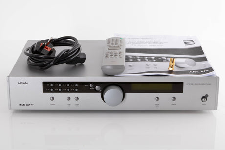 Front view of a used Arcam DT91 Digital Radio Tuner in Silver with mains cable, remote, and BNC adaptor