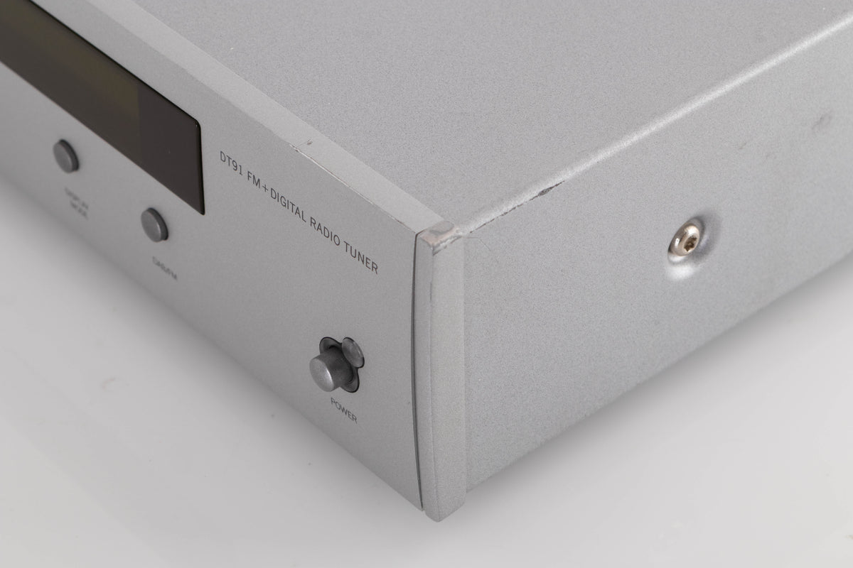 Front right corner view of a used Arcam DT91 Digital Radio Tuner in Silver