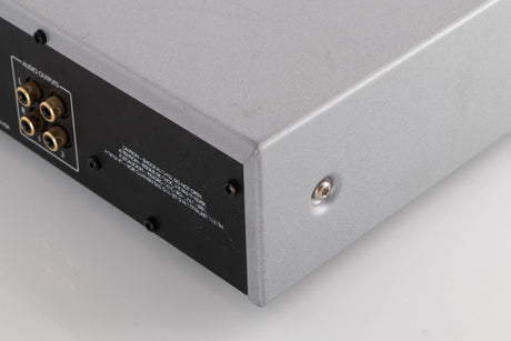 Rear right corner view of a used Arcam DT91 Digital Radio Tuner in Silver