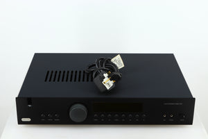 Top of a used Arcam FMJ A19 Integrated Amplifier in a black finish showing Mains Cable