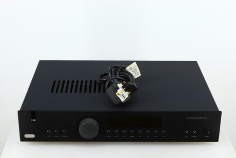 Top of a used Arcam FMJ A19 Integrated Amplifier in a black finish showing Mains Cable