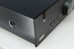Front left corner of a used Arcam FMJ A19 Integrated Amplifier in a black finish