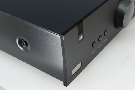 Front left corner of a used Arcam FMJ A19 Integrated Amplifier in a black finish