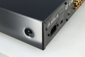 Rear right corner of a used Arcam FMJ A19 Integrated Amplifier in a black finish