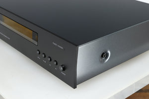 Front right corner of a used Arcam FMJ CDS27 CD Player in a black finish