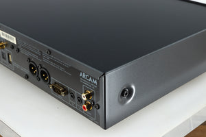 Rear left corner of a used Arcam FMJ CDS27 CD Player in a black finish