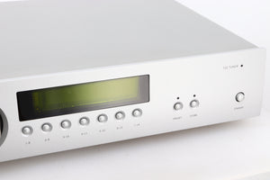Close up of a used Arcam FMJ T32 FM / DAB Tuner in a silver finish showing some of the fascia