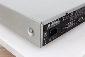 Rear right corner of a used Arcam FMJ T32 FM / DAB Tuner in a silver finish
