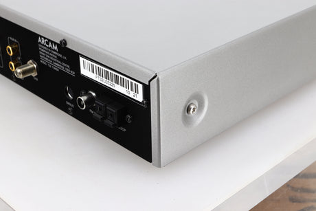 Rear left corner of a used Arcam FMJ T32 FM / DAB Tuner in a silver finish