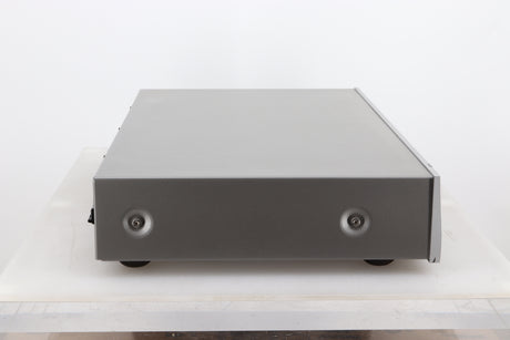 Left side view of a used Arcam FMJ T32 FM / DAB Tuner in a silver finish