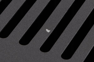 Close up of a used Arcam P349 Power Amplifier in a Black finish showing small chip on top