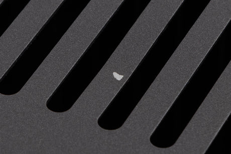 Close up of a used Arcam P349 Power Amplifier in a Black finish showing small chip on top