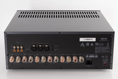 Rear view of a used Arcam P349 Power Amplifier in a Black finish showing Phono Inputs, Phono Outputs, Mains Input and XLR Inputs