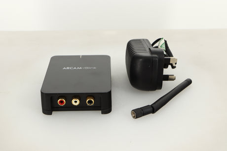 Front view of a used Arcam R-Blink Bluetooth Receiver with mains cable, and antenna