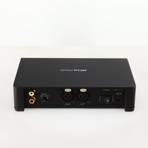 Rear view of a used Arcam rHead Headphone Amplifier in a black finish showing Phono Inputs and Power Input