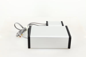 Left side view of a used MCRU Power Supply in a silver finish