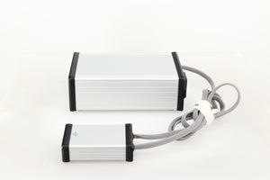 Right side view of a used MCRU Power Supply in a silver finish