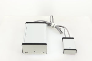 Top of a used MCRU Power Supply in a silver finish