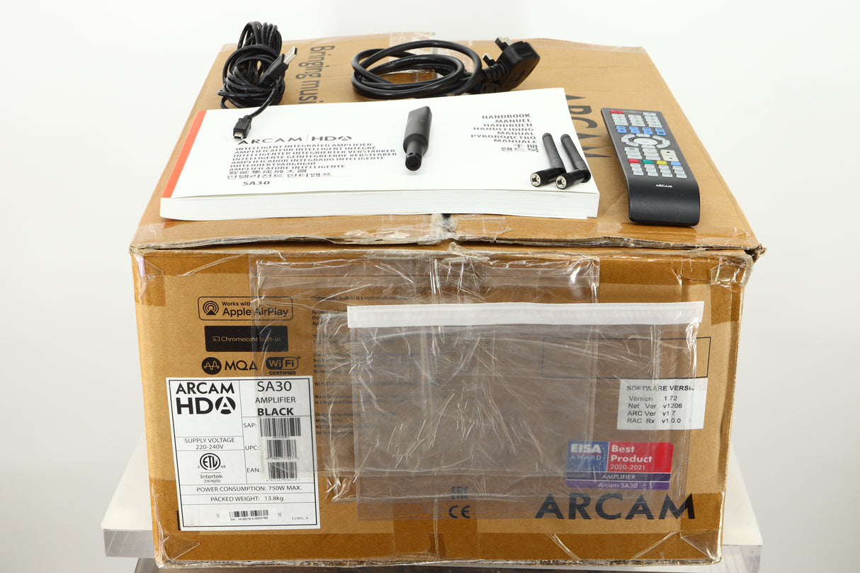 Box of a used Arcam SA30 Integrated Amplifier showing mains cable, manual, remote, setup microphone, and 2 wifi antennas