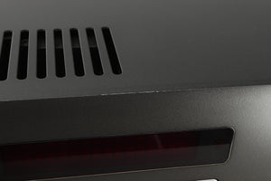 Close up view of a used Arcam SA30 Integrated Amplifier showing scratching on the top edge of the fascia