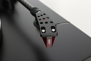 Close up of a used Argon TT-3 PLUS Turntable / Ortofon 2M Red Cartridge in a black finish showing cartridge