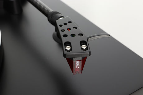 Close up of a used Argon TT-3 PLUS Turntable / Ortofon 2M Red Cartridge in a black finish showing cartridge