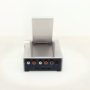 Rear view of a used Astrell & Kern Acro CA1000 Headphone Amplifier in a silver finish showing USB Input, Phono Inputs, Phono Outputs and Optical Input