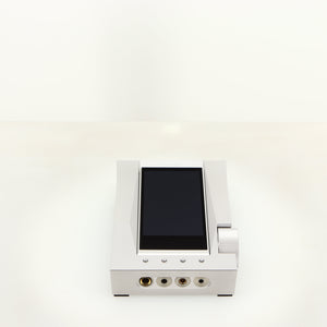 Top of a used Astrell & Kern Acro CA1000 Headphone Amplifier in a silver finish showing screen down