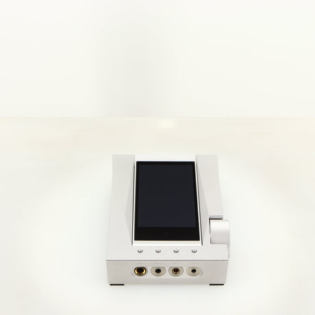 Top of a used Astrell & Kern Acro CA1000 Headphone Amplifier in a silver finish showing screen down