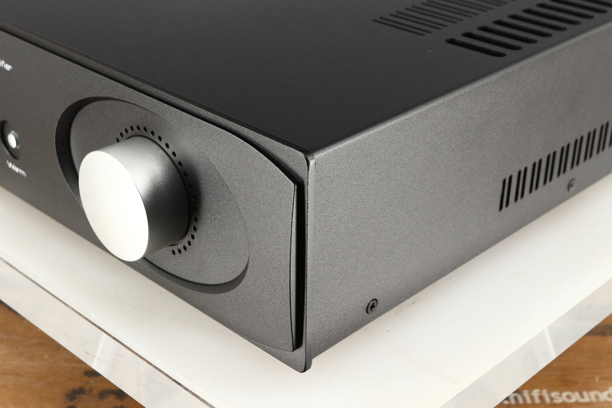 Front right corner of a used Astin Trew AT2-2100 Integrated Amplifier in a black finish